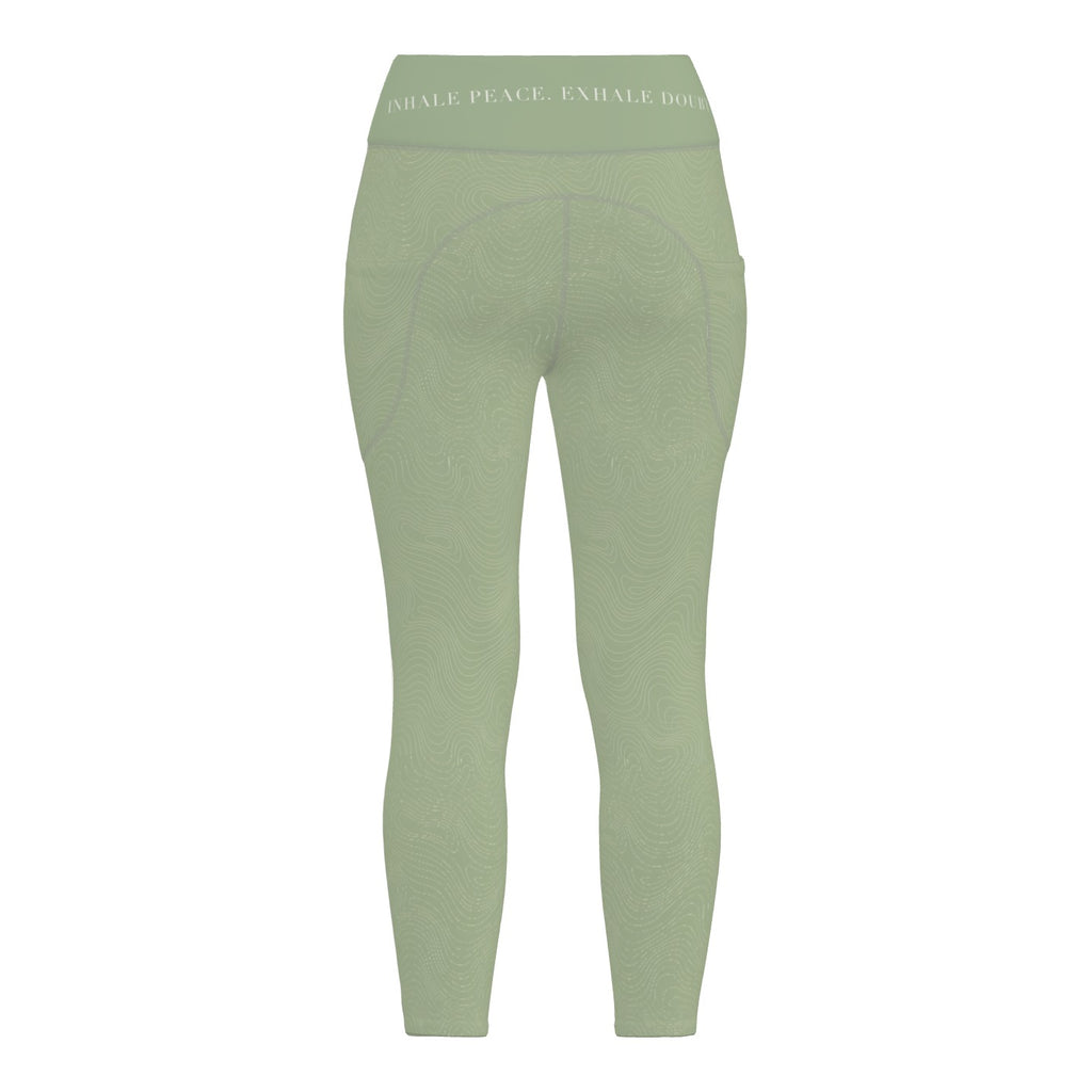 Breath Lines Sage leggings, back view with INHALE PEACE. EXHALE DOUBT. on the waistband