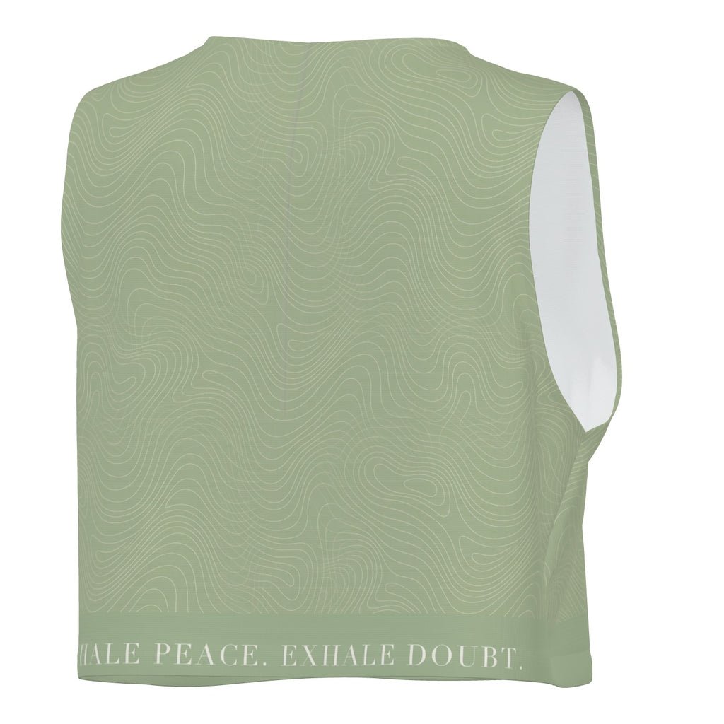 Breath Lines Sage crop tank, back view with INHALE PEACE. EXHALE DOUBT. on the hem band